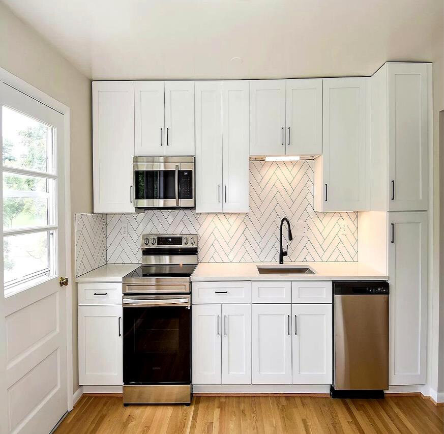 After renovation – Kitchen in Silver Spring, MD - Deerhurst Terrace