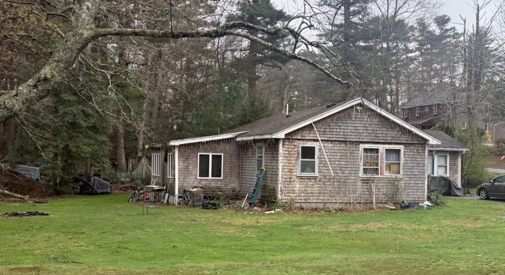 Older ranch style home with overgrown yard and maintenance issues in Halifax MA – we buy houses as is Halifax MA