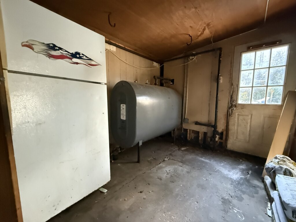 Interior before renovation – 43 Buttonwood Road, Halifax Massachusetts