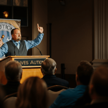 what do land auctioneers charge in Alford Florida