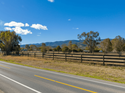 purchasing land with existing structures or improvements