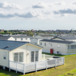 Rows of mobile homes in a park setting, illustrating mobile home cost and community living.