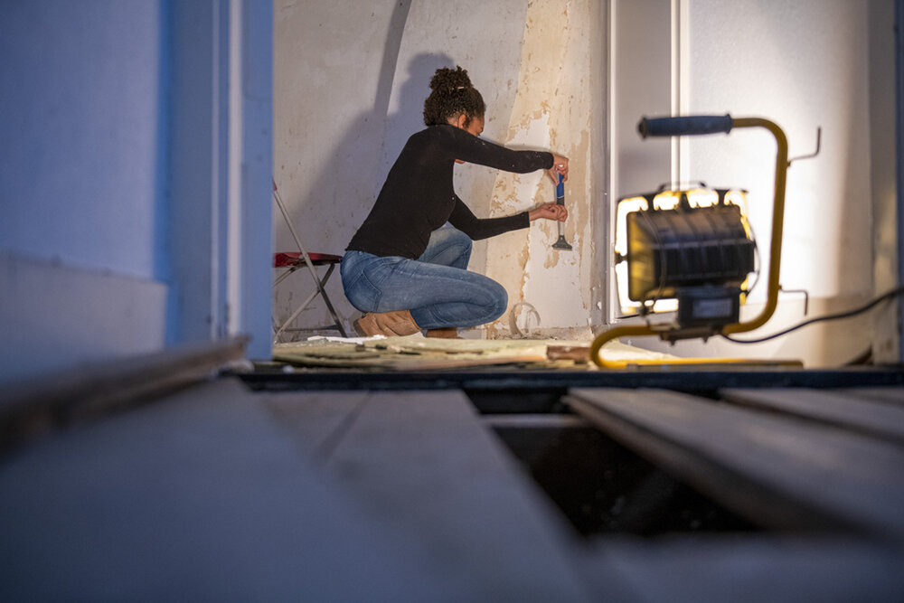 woman focused on Hampstead NC home repair from fast cash sale