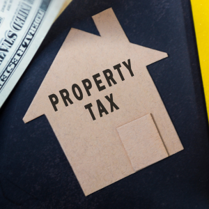Is it possible to sell a house with taxes due in Garland