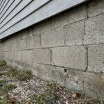 Winnipeg house showing foundation cracks along the base