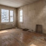 Empty vacant Winnipeg house interior with bare walls and dusty floors
