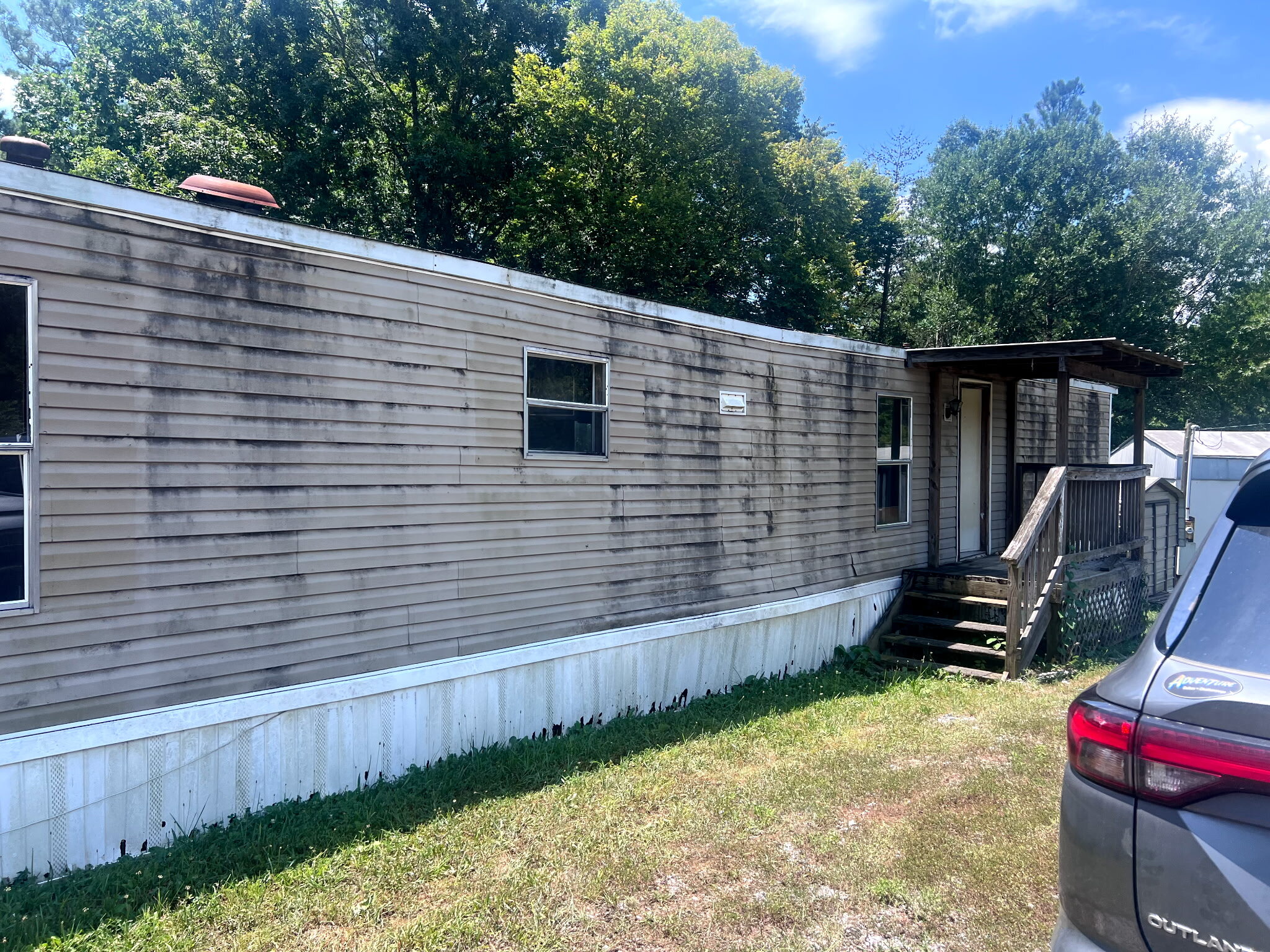 Aging single-wide mobile home on land in Knox County TN