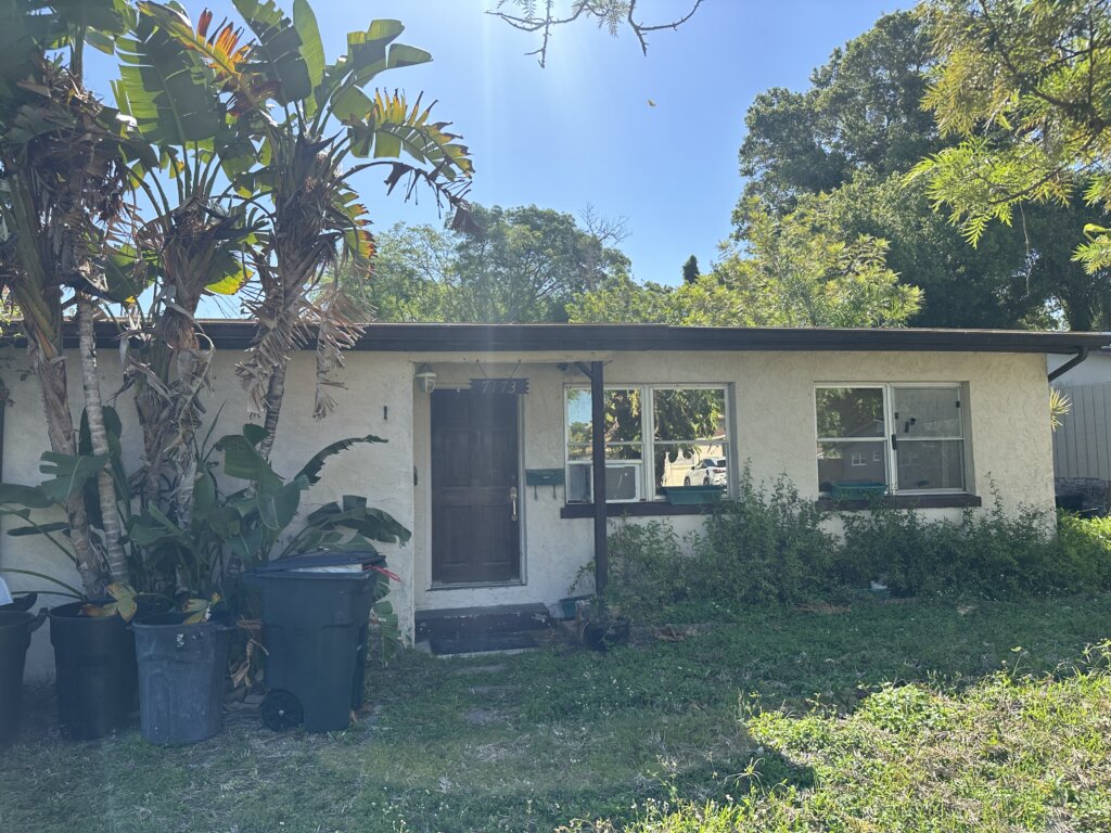 Exterior photo of the house A+ Home Buyers purchased from Terry and Del. House looks to be in need of exterior repair. 