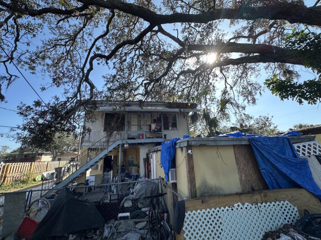 Saint Petersburg quadplex sold with liens paid at closing exterior