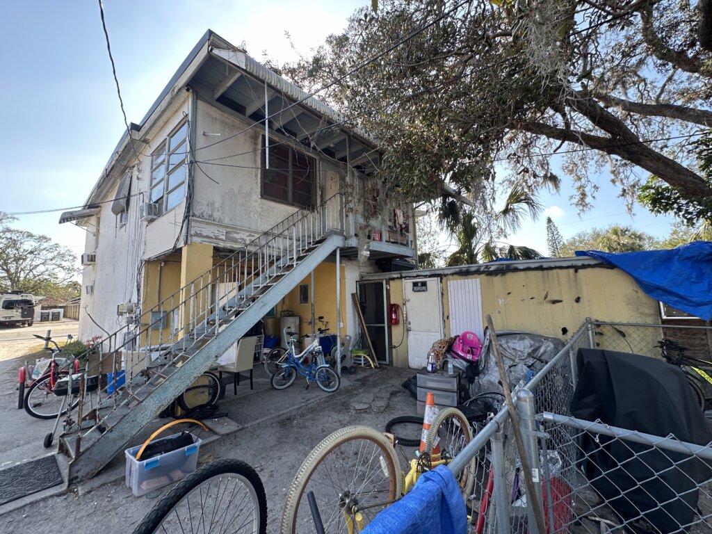 Saint Petersburg quadplex sold with liens paid at closing exterior of back yard