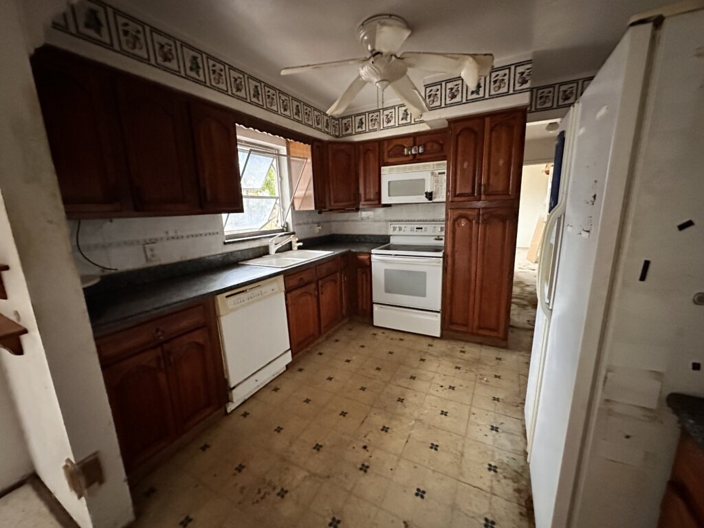 Saint Petersburg house sold with code violation liens interior after trash out