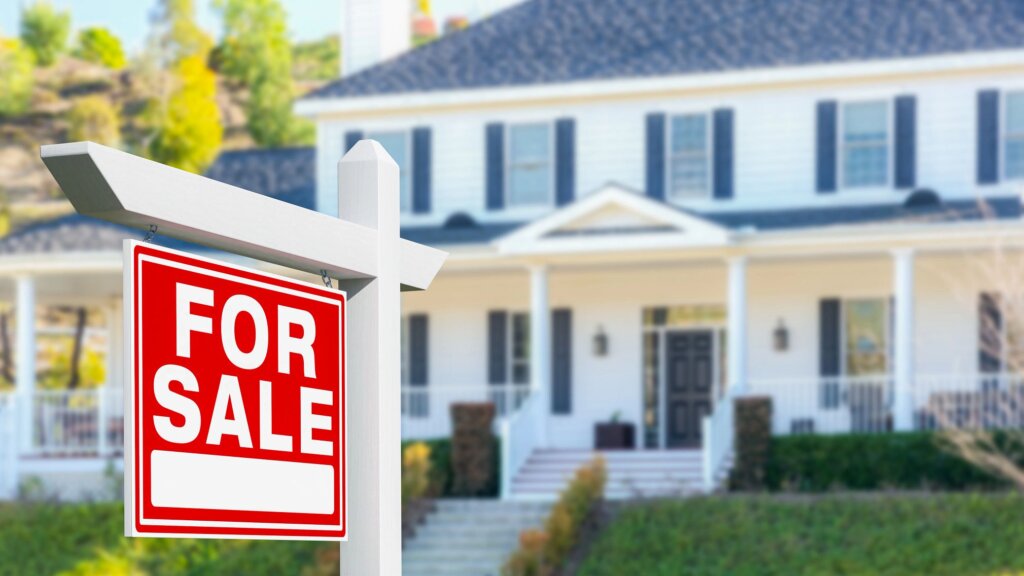 Buffalo homeowner comparing ways to sell a house fast, including an as-is cash offer and traditional listing