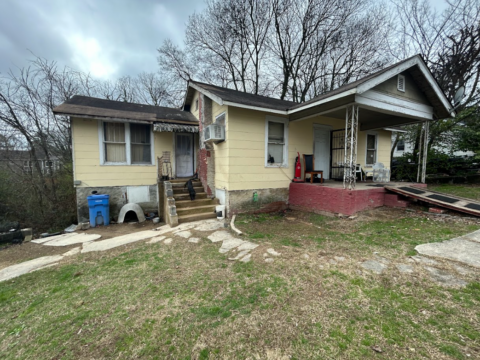 Side View of House Needing Significant Repairs Showing Deterioration