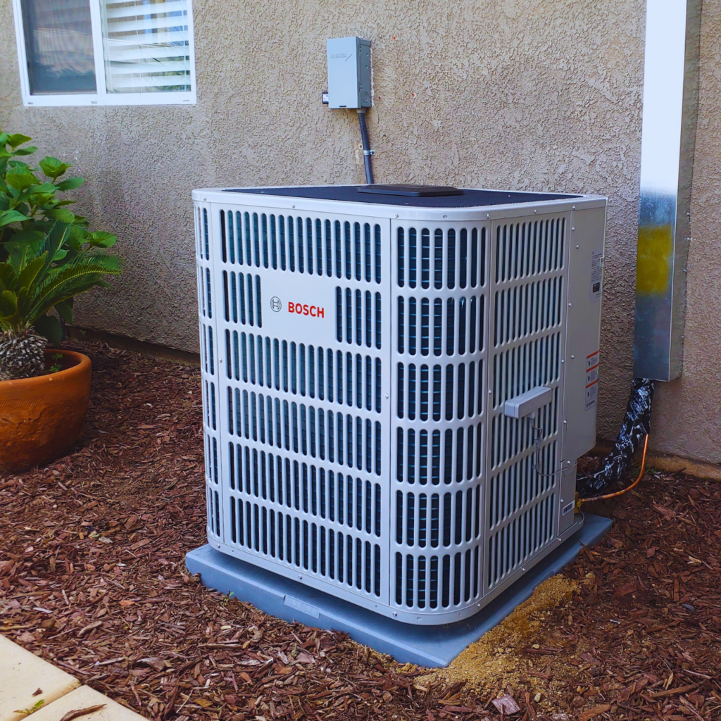 A Bosch heat pump condenser relocated
