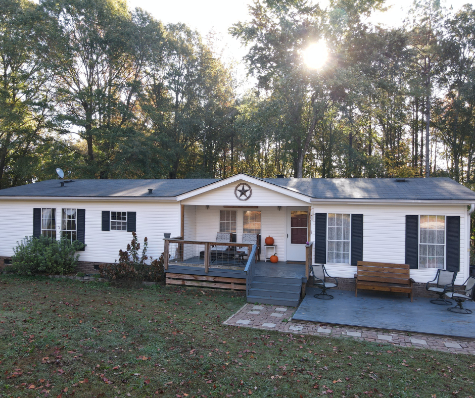 Mobile Home Mover Visits Mobile Home to Give Estimate To Owner.