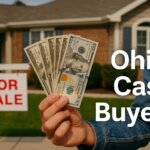 Smiling Ohio couple receiving cash from a buyer in front of their home with a sold sign, representing Ohio cash buyers.