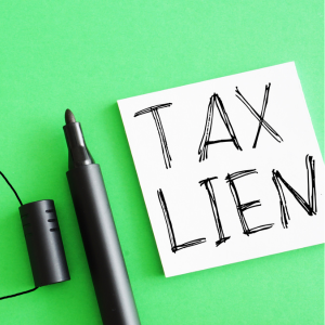 Can a House Be Sold With a Lien in Fayetteville, NC