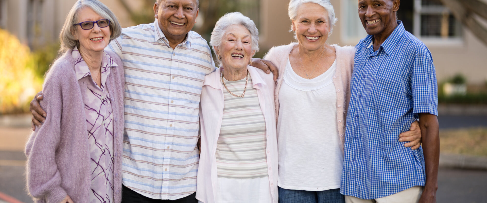 Seniors enjoying beautiful day outside Florida nursing home