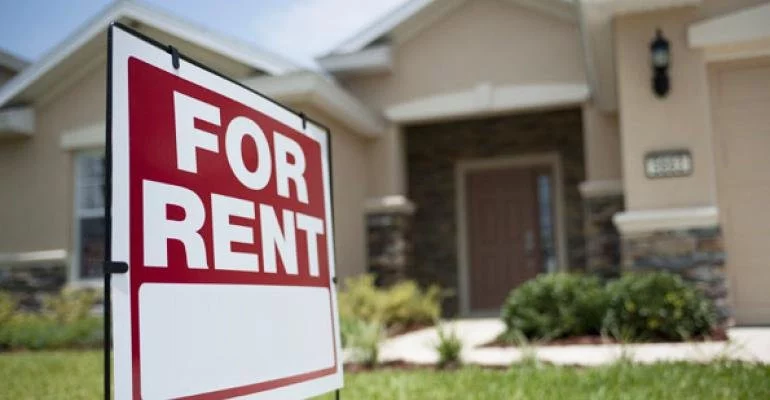 For rent sign in front of a single-family home in South Carolina, representing a landlord looking to sell a rental property fast to Table Rock Homebuyers.