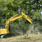 how much does it cost to clear 1 acre of wooded land