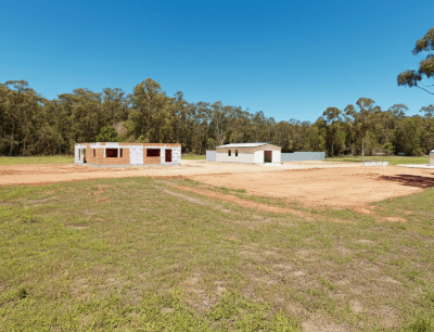 buying land with existing structures or improvements