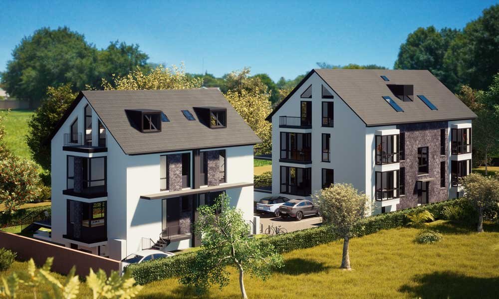 Two modern, sleek duplex homes with black roofs and large windows, set in a green, landscaped area. The homes have a minimalist design with white and dark grey facades, each featuring private balconies and parking spaces.