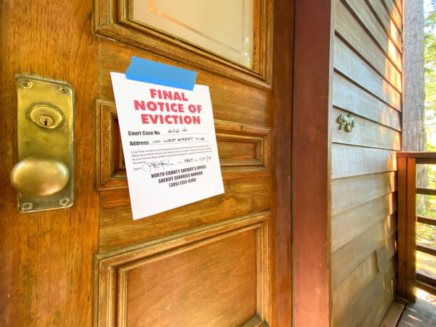A front door with a taped notice that reads "Final Notice of Eviction," signaling an eviction process. The image emphasizes the gravity of a legal situation and the potential hardships faced by the homeowners.