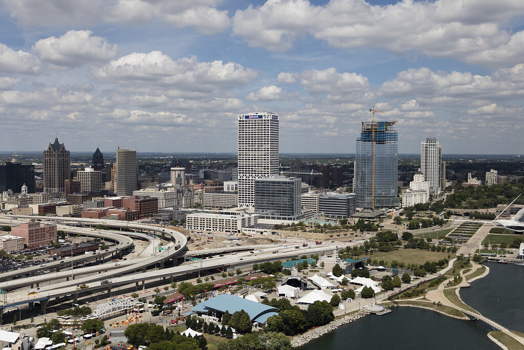 Milwaukee cityscape with modern buildings and waterfront.