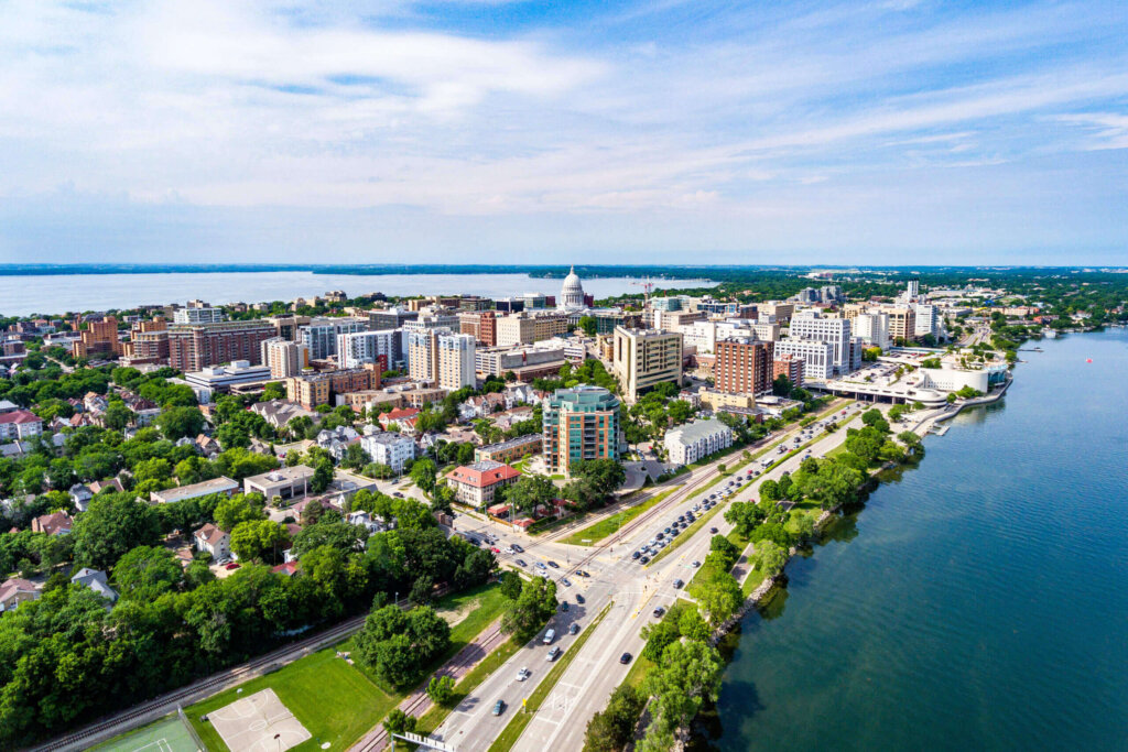 Aerial view of downtown Madison, Wisconsin, with the state capitol building and Lake Monona.
