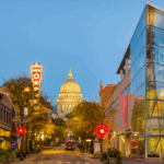 Downtown Madison with Capitol building and New Orpheum sign at dusk.