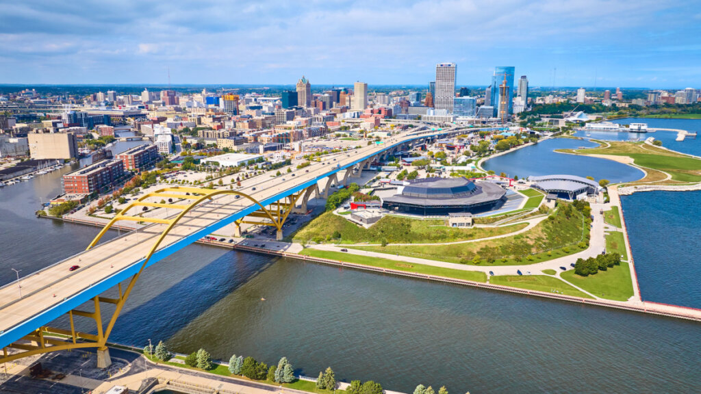 Aerial view of downtown Milwaukee and the Hoan Bridge over Lake Michigan, representing Sell As-Is in Milwaukee real estate opportunities.