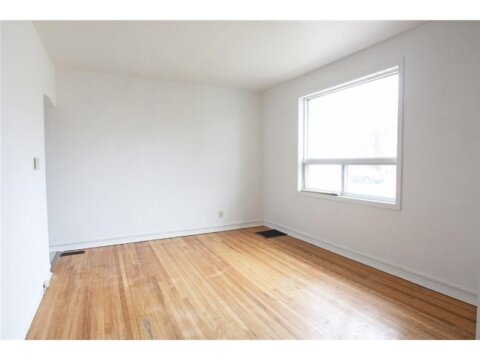 living room of house we purchased on Blair Ave in Hamilton