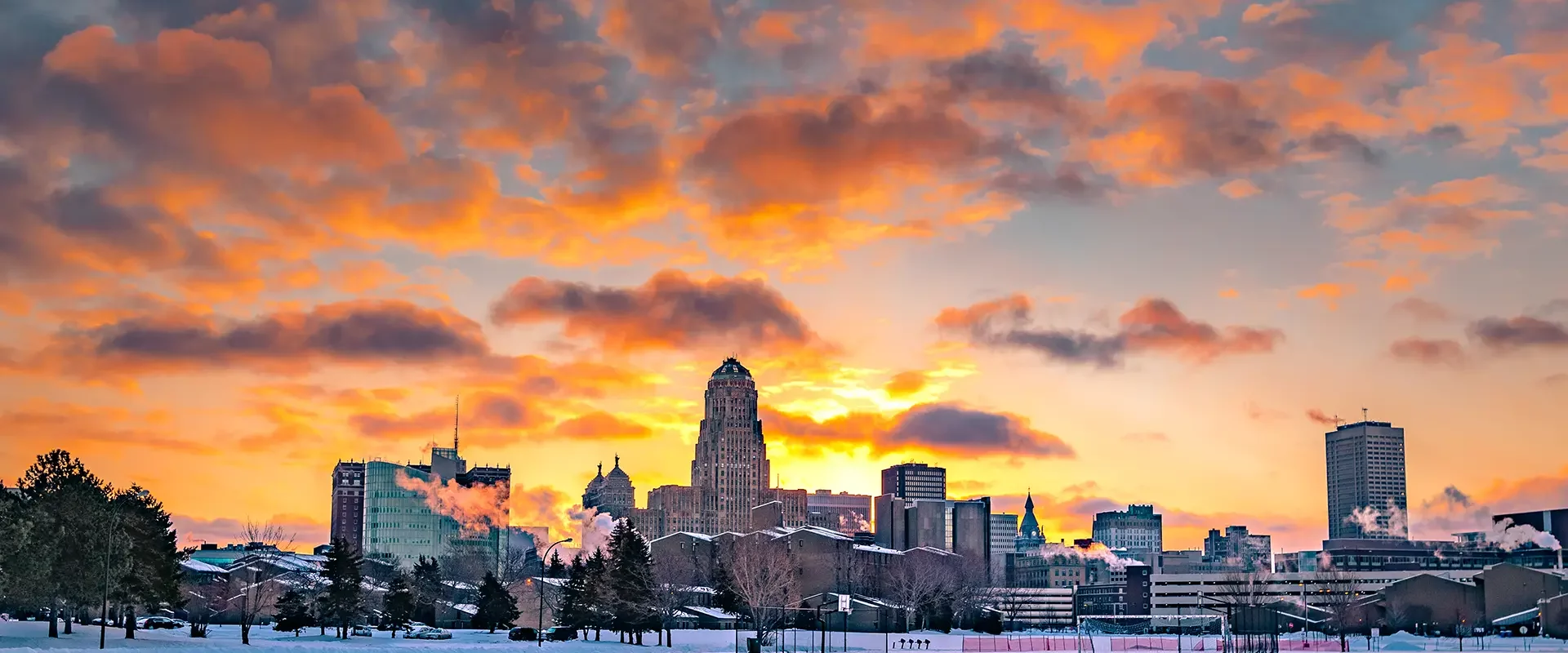 Sell my house fast Buffalo NY - Skyline view of downtown at sunrise.