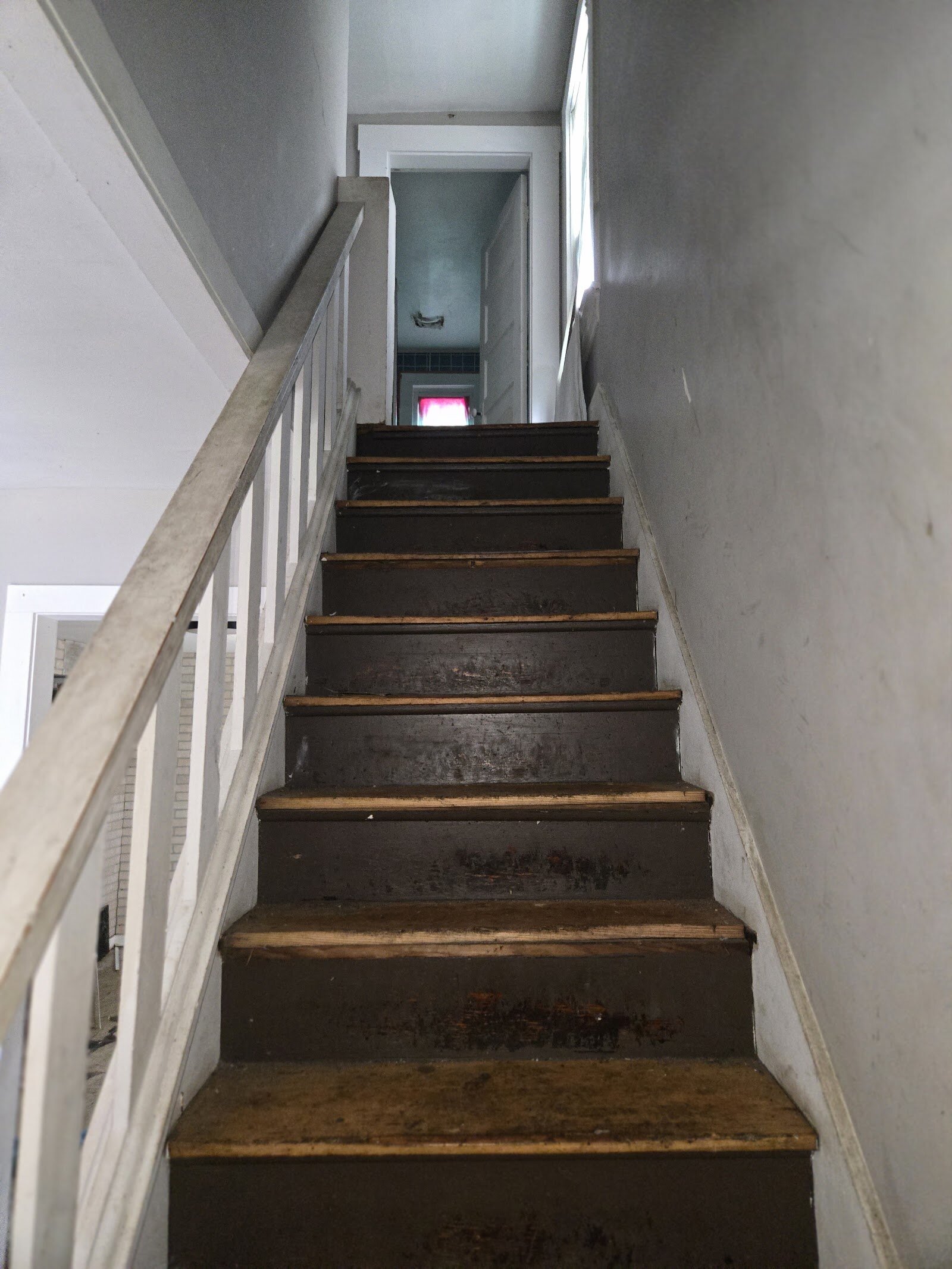 Staircase and hallway at 23 North Douglas Avenue before renovation