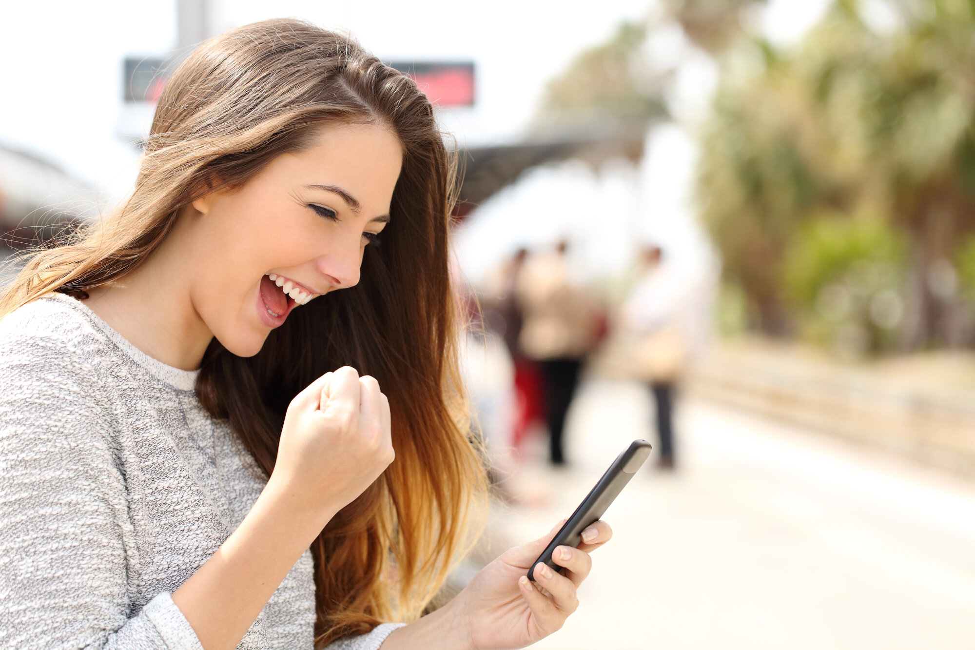 woman watching her phone
