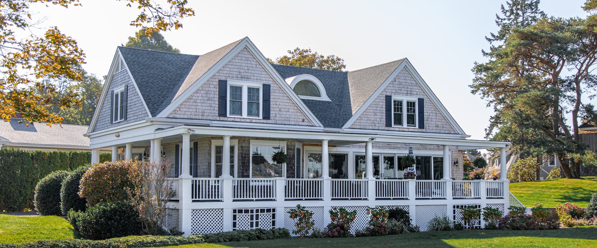 a house in a green yard in ct