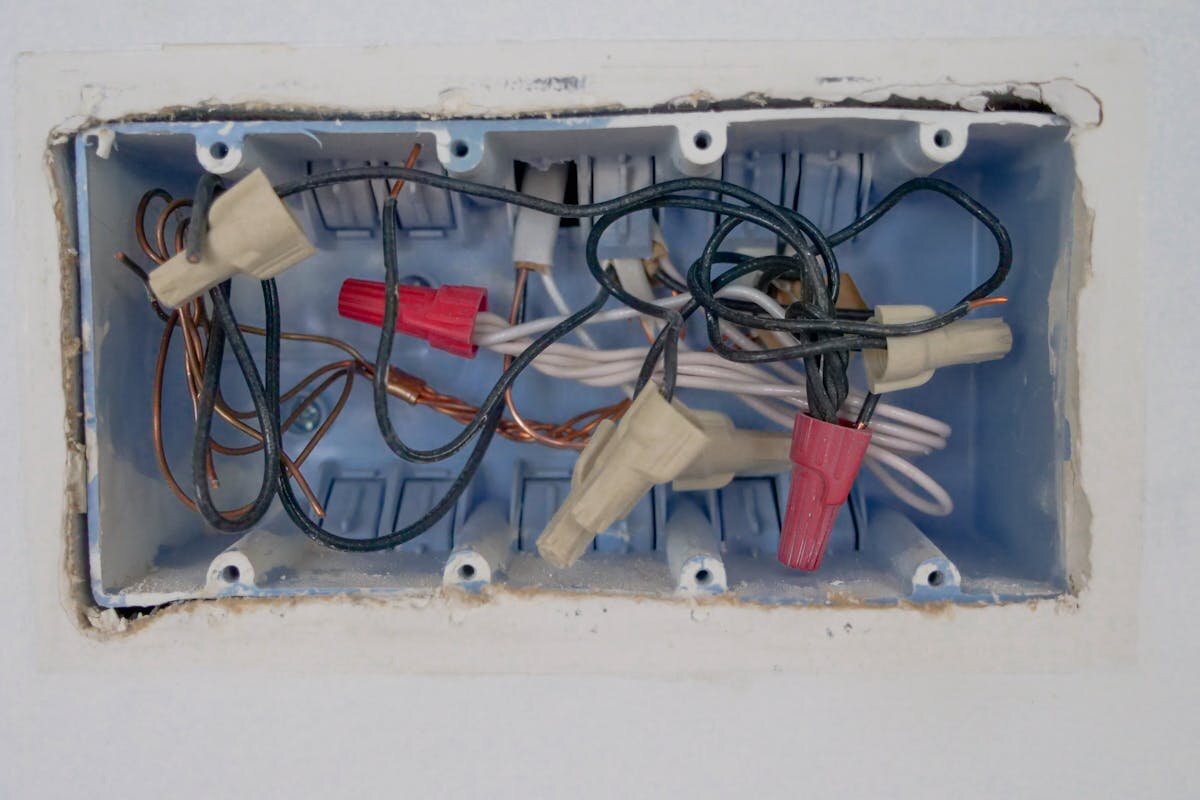 an electrical outlet ready to be rewired