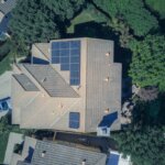A an above view of a house with solar panels