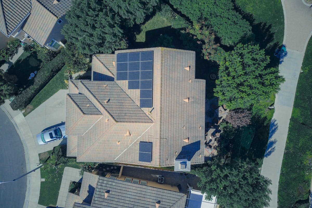 A an above view of a house with solar panels