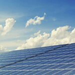 Solar panels being reflected off the sky