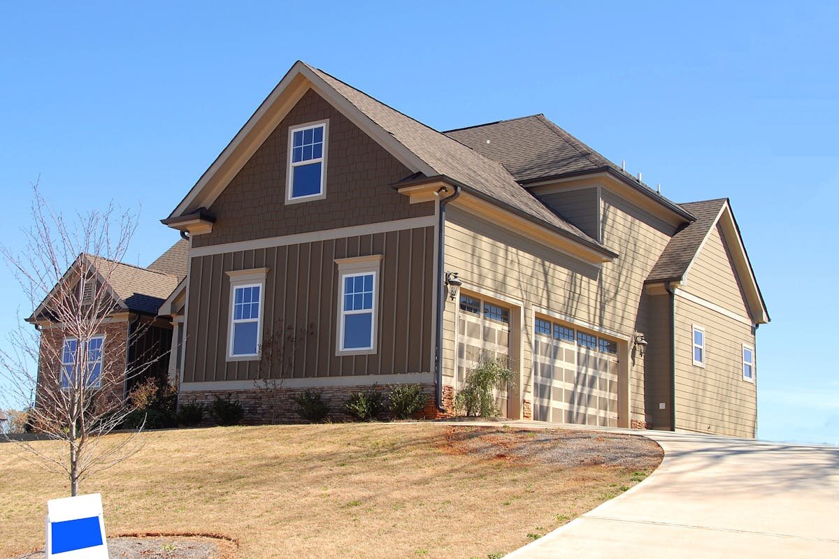 A house that is on a hill that was freshly built