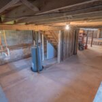 A basement with a ton of concrete all around on the foundation