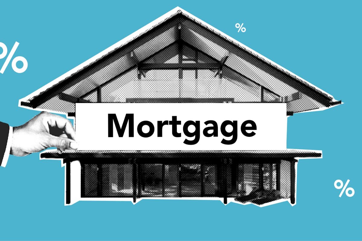 A house with a giant mortgage sign in front of it