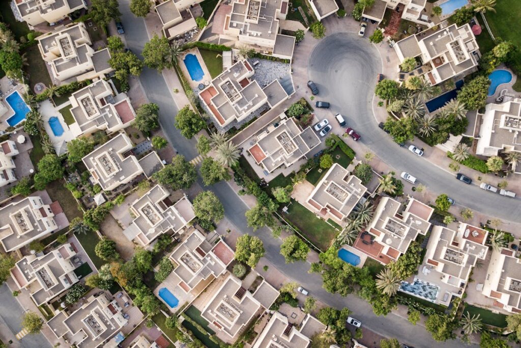 A suburban area that has a cul-de-sac in the middle