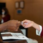 A person making a down payment on a home