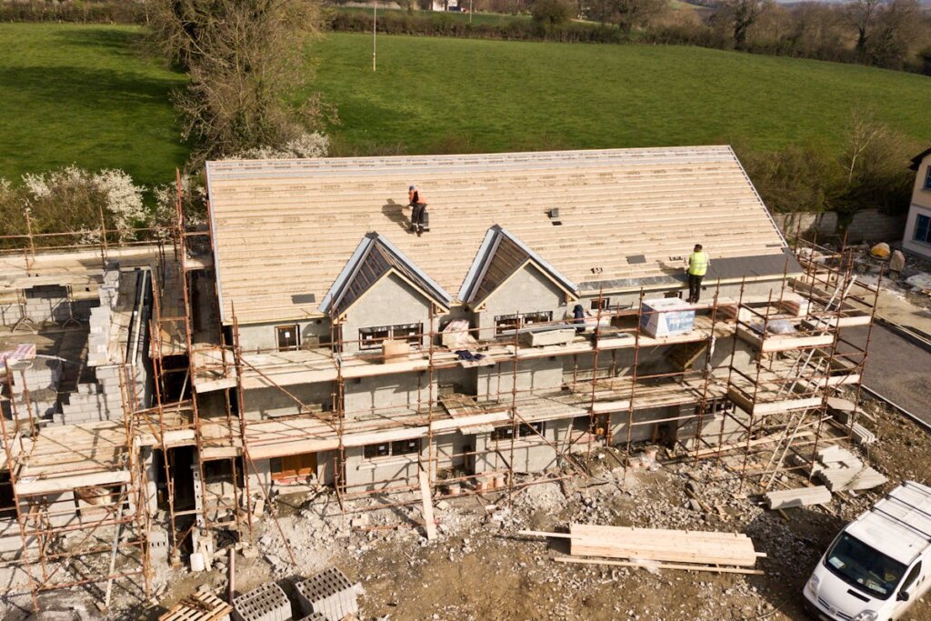 A house being built on a piece of land