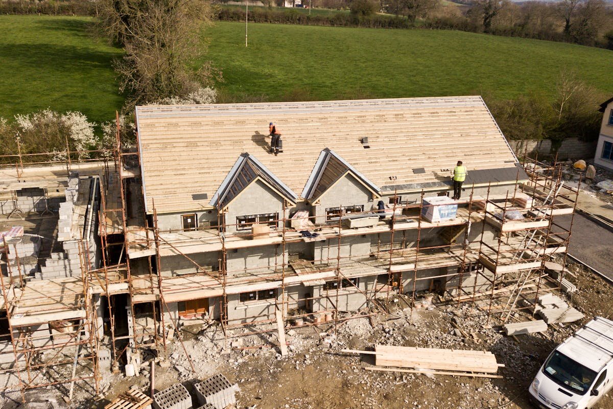 A house being built on a piece of land