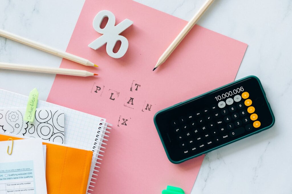 A bunch of tax papers with a calculator