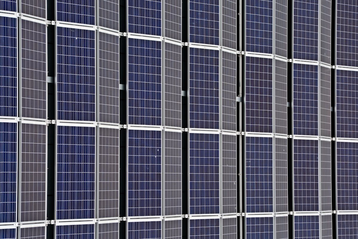 A bunch of solar panels all lined up perfectly