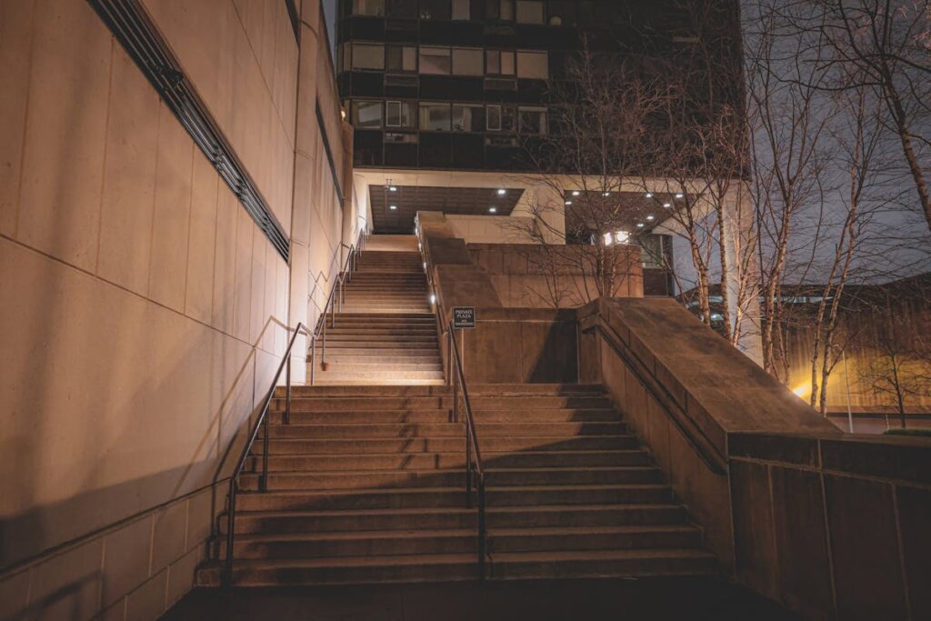 A staircase leading up to a large building